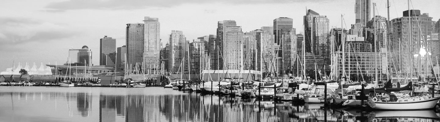 View of Vancouver skyline with harbor at sunset