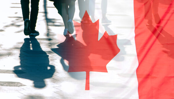 Canadian flag overlaid on photo of people walking down the street